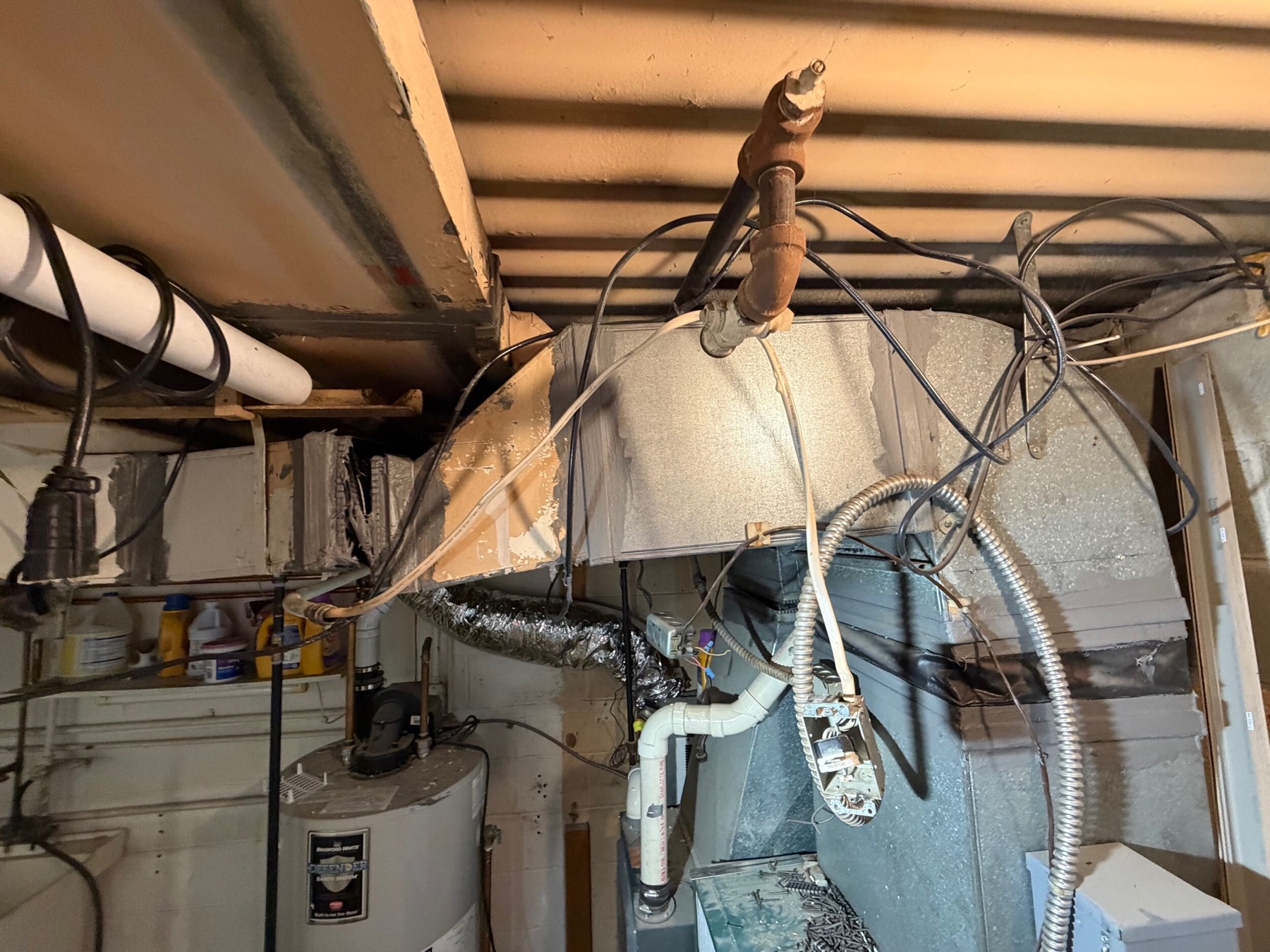 Basement mechanical and service runs exposed
